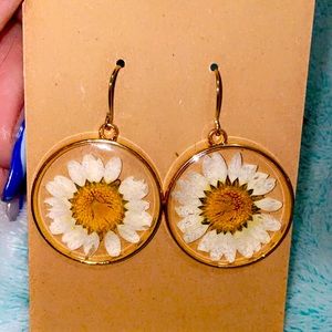 Clear daisy dangle earrings